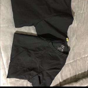 Two black scrub sets